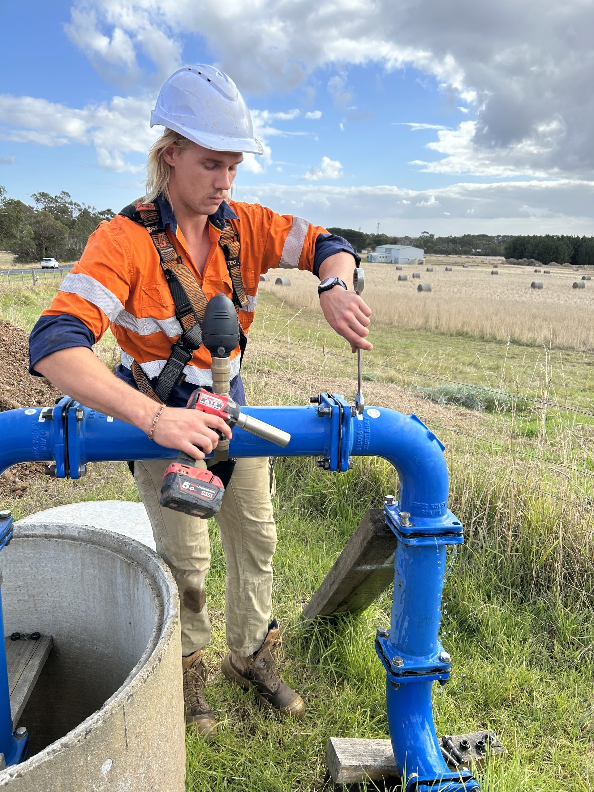 A Westernport Water staff member with the upgraded above ground access to the Pressure Reducing Valve (PRV)